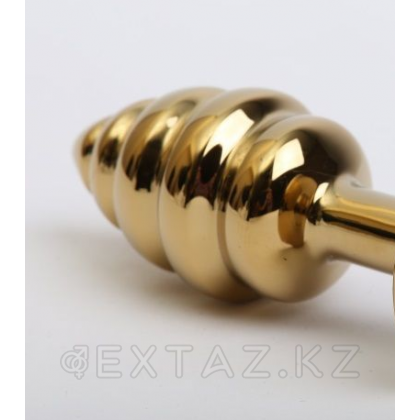 Золотистая анальная пробка с белым хвостиком от sex shop Extaz фото 2